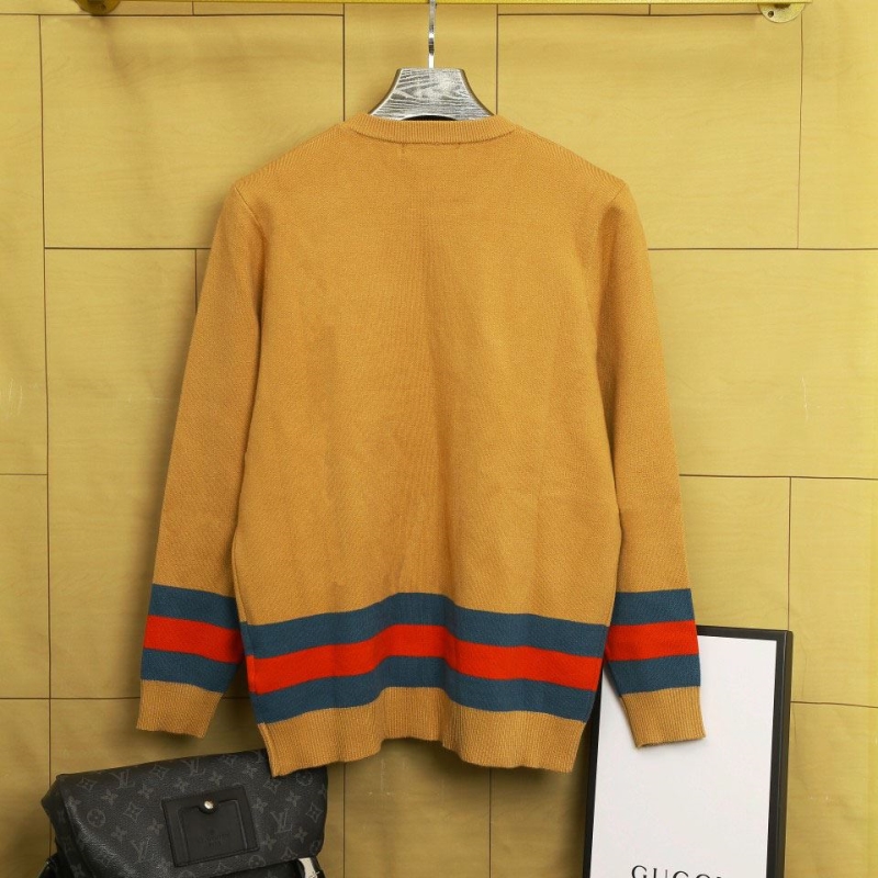 G*u*i sweaters